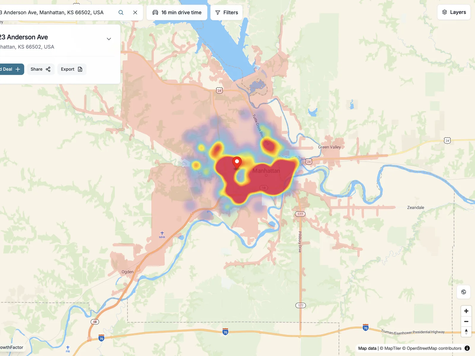 Foot-traffic heatmap over Manhattan, KS, with the candidate pin at the edge of the hottest corridor.
